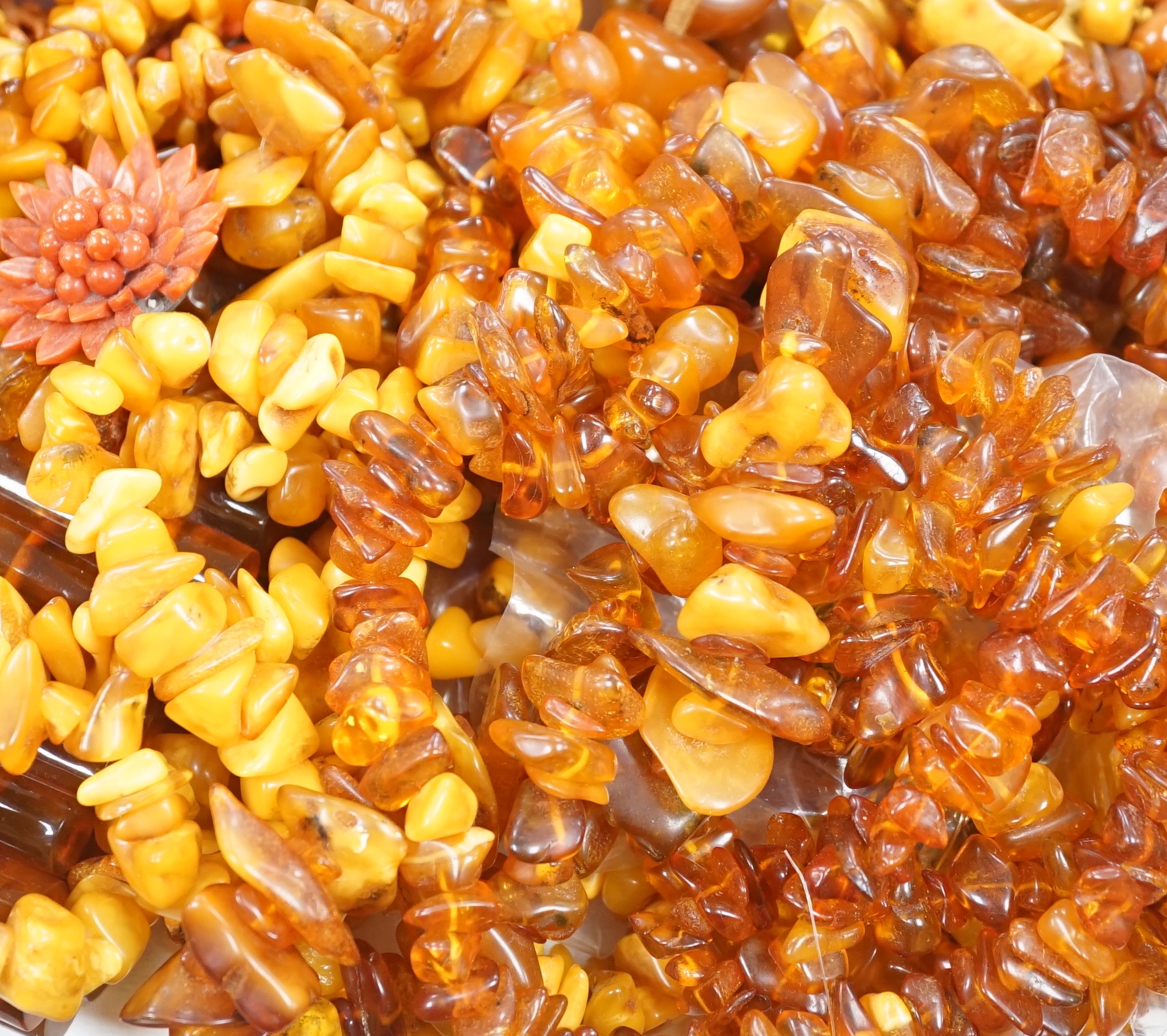 A collection of coral and mainly amber and amberoid jewellery.